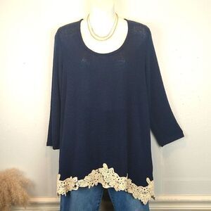 Charming Charlie knit blue long sleeve sweater with crochet and keyhole back